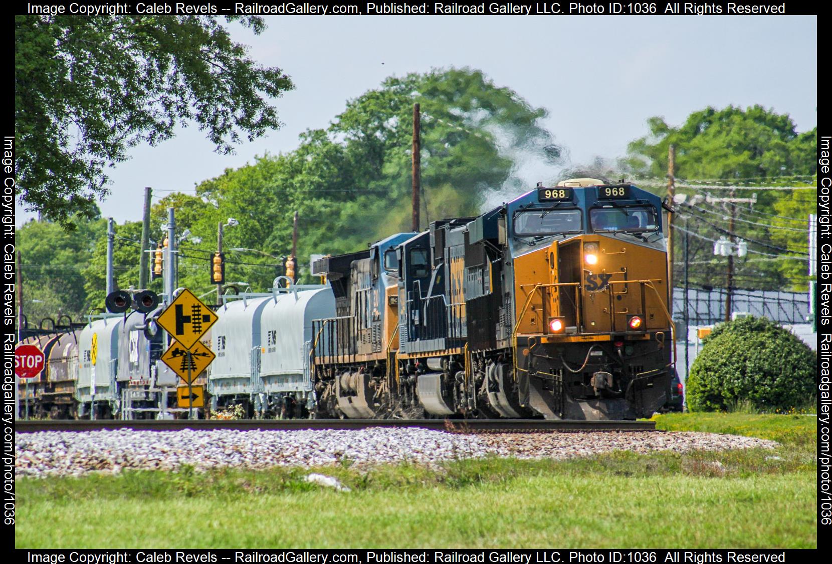 CSXT 968 is a class GE ES44AC and  is pictured in Woodruff, South Carolina, USA.  This was taken along the CSX Spartanburg Subdivision  on the CSX Transportation. Photo Copyright: Caleb Revels uploaded to Railroad Gallery on 05/05/2023. This photograph of CSXT 968 was taken on Tuesday, April 04, 2023. All Rights Reserved. 